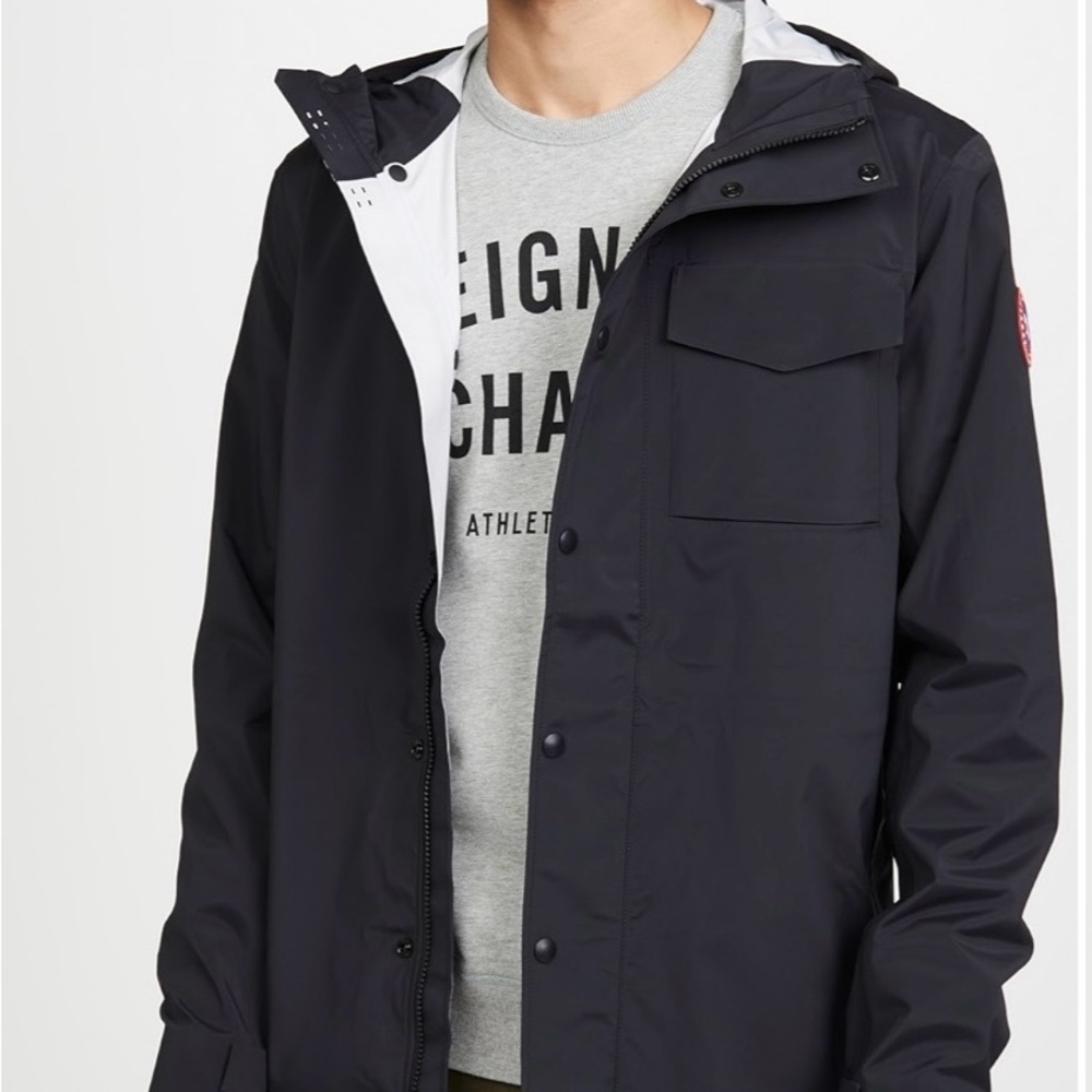 Canada Goose Nanaimo Blue Raincoat with Hood and Water-Resistant Material